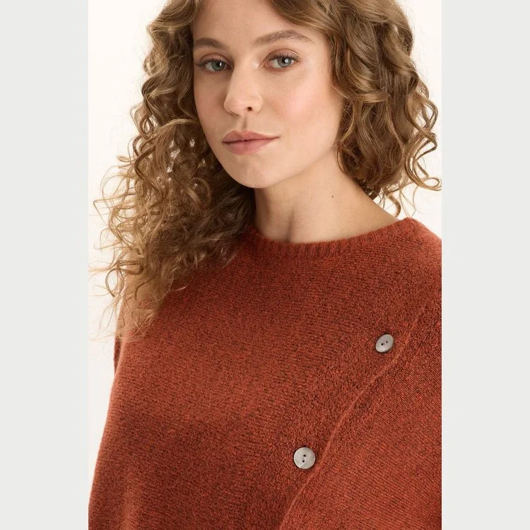 The osiris asymmetrical button detail knit poncho sweater by XCVI in sprightly poppy color