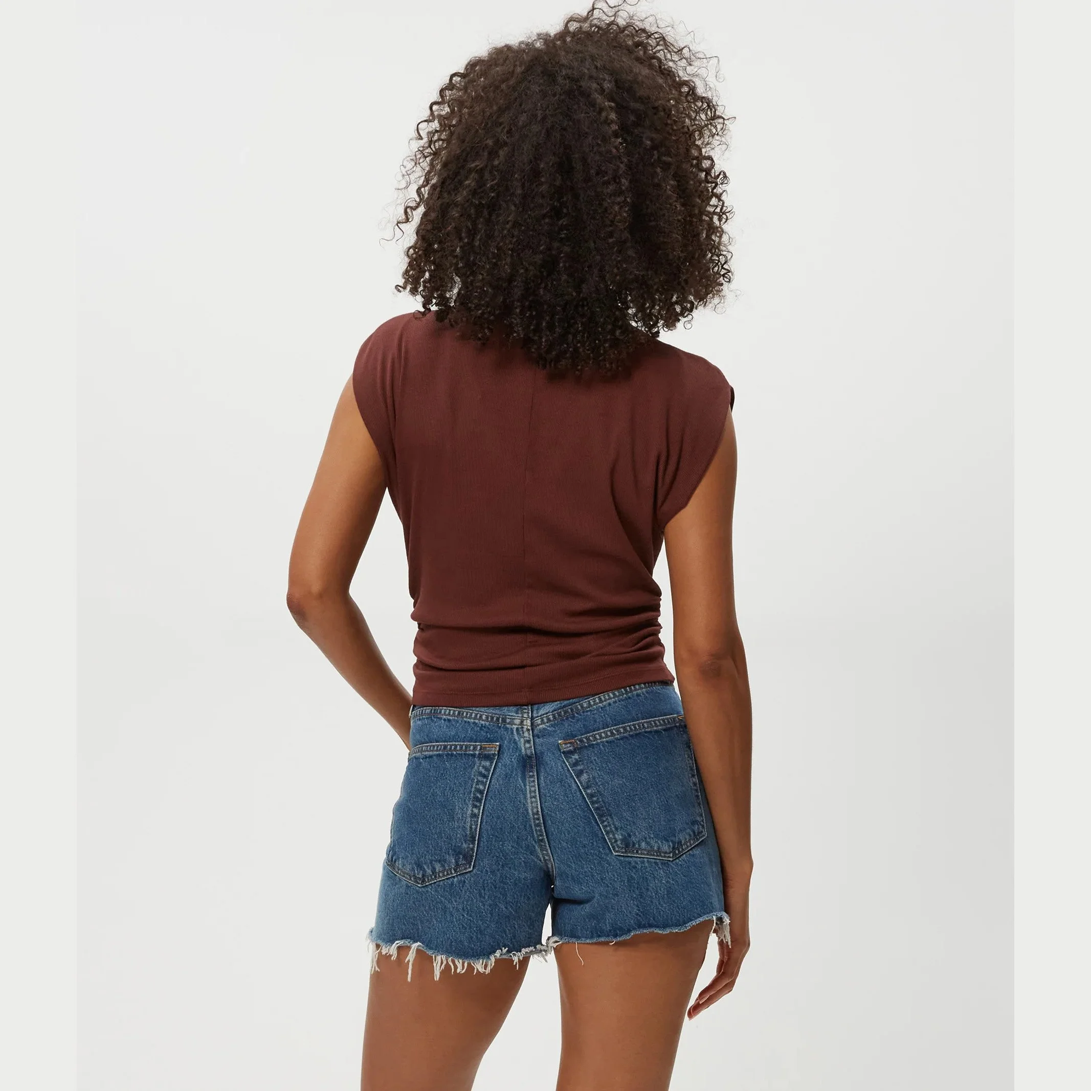 The amara mock neck power shoulder top by Michael Stars in espresso (brown) color