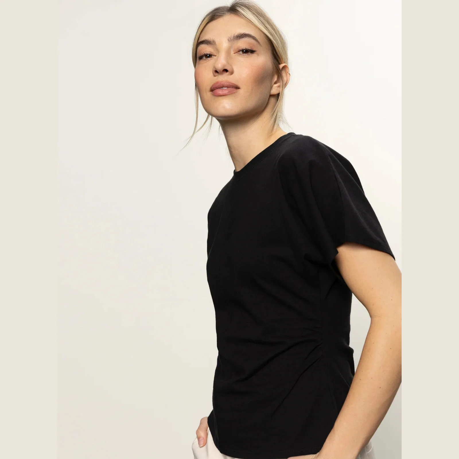 The shirred waist dolman tee in black by Sanctuary Clothing