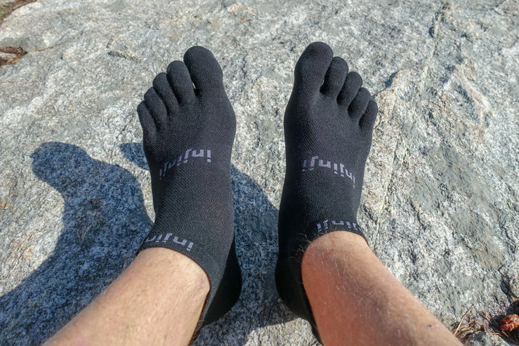 Toe socks, such as the  injinji no-shows , can help prevent toe blisters.