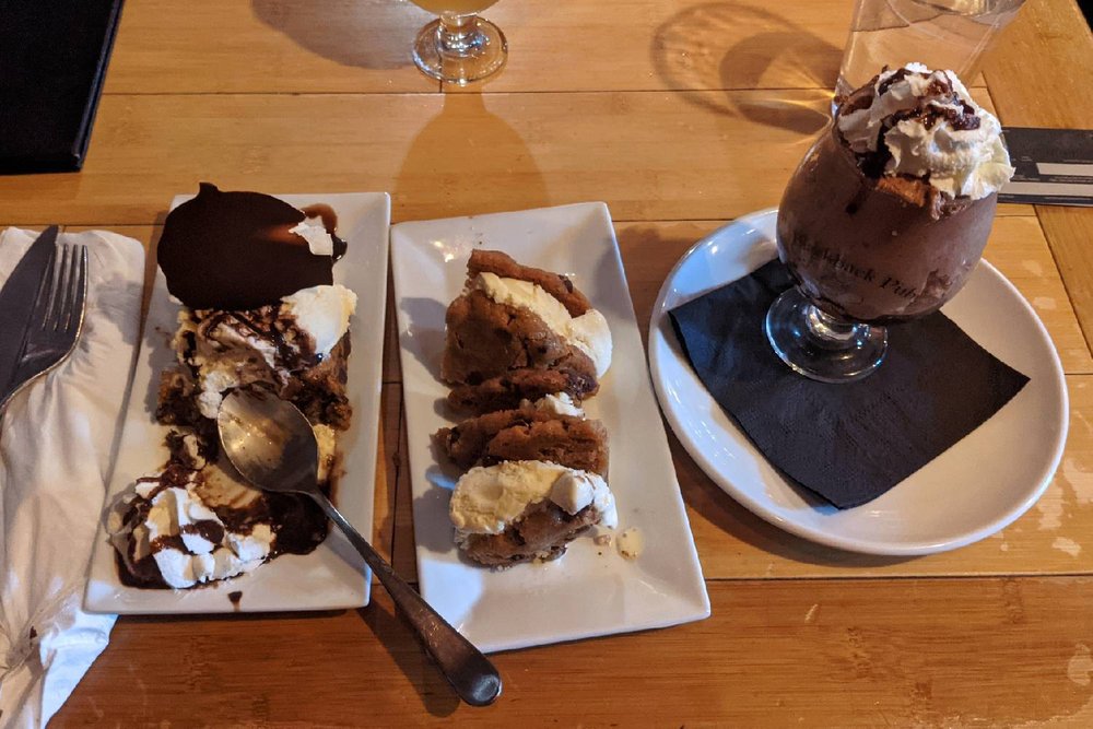 Three plates of dessert on a table at Blackback in Waterbury Vermont