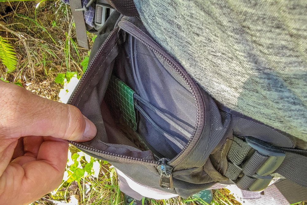 Closeup of the ULA Alpha Knife in the hip belt pocket of the ULA Circuit Backpack