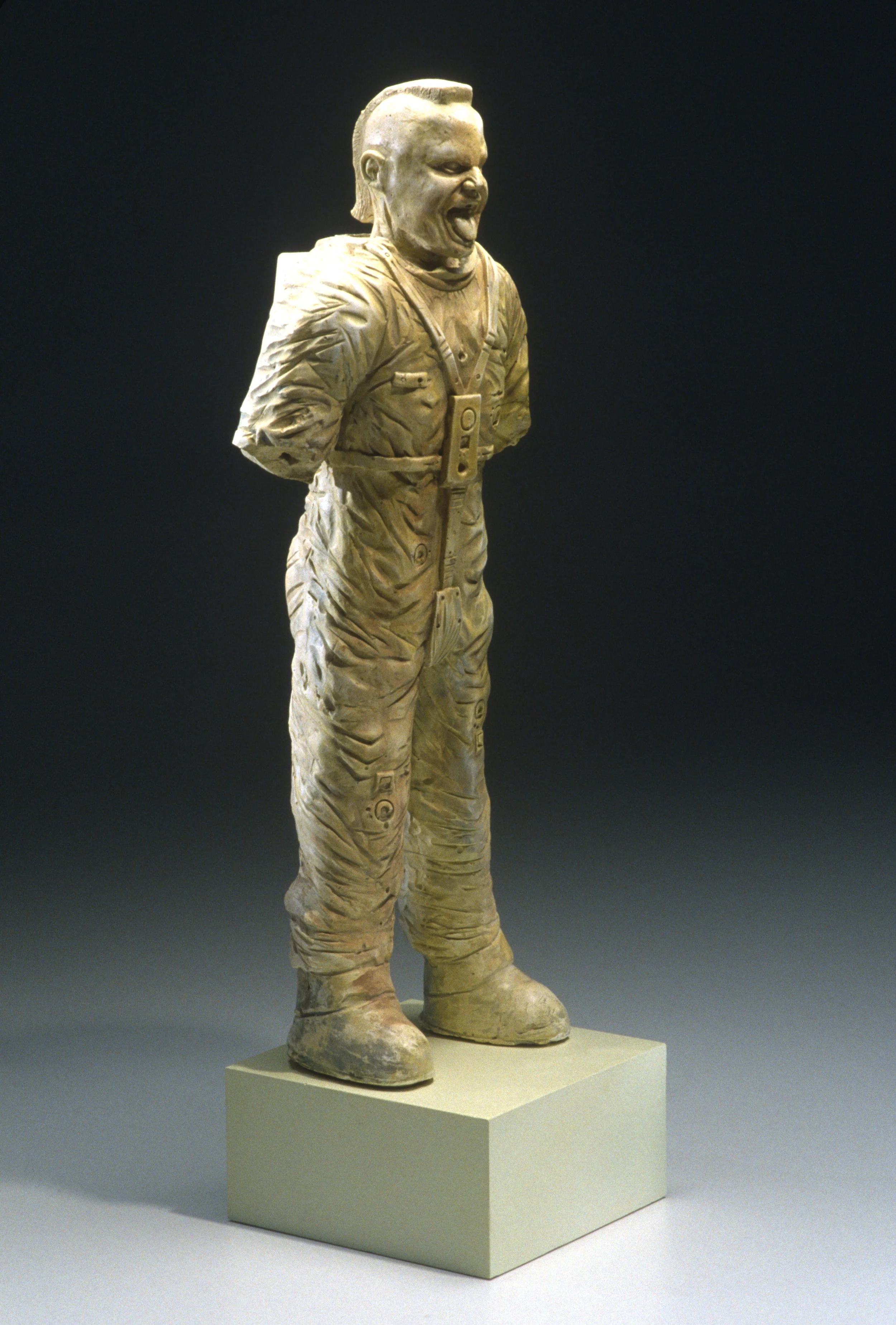 Aztec Astronauts, Mohawk antiquity 2001, plaster, 22" x 9" x 7" 