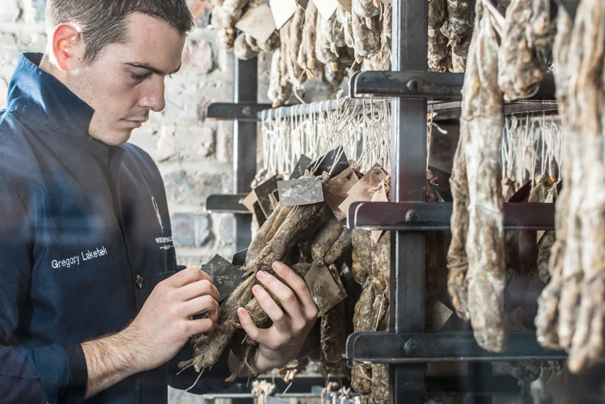 Greg Laketek (owner of West Loop Salumi, Chicago, IL) checks the maturation of his salumi.