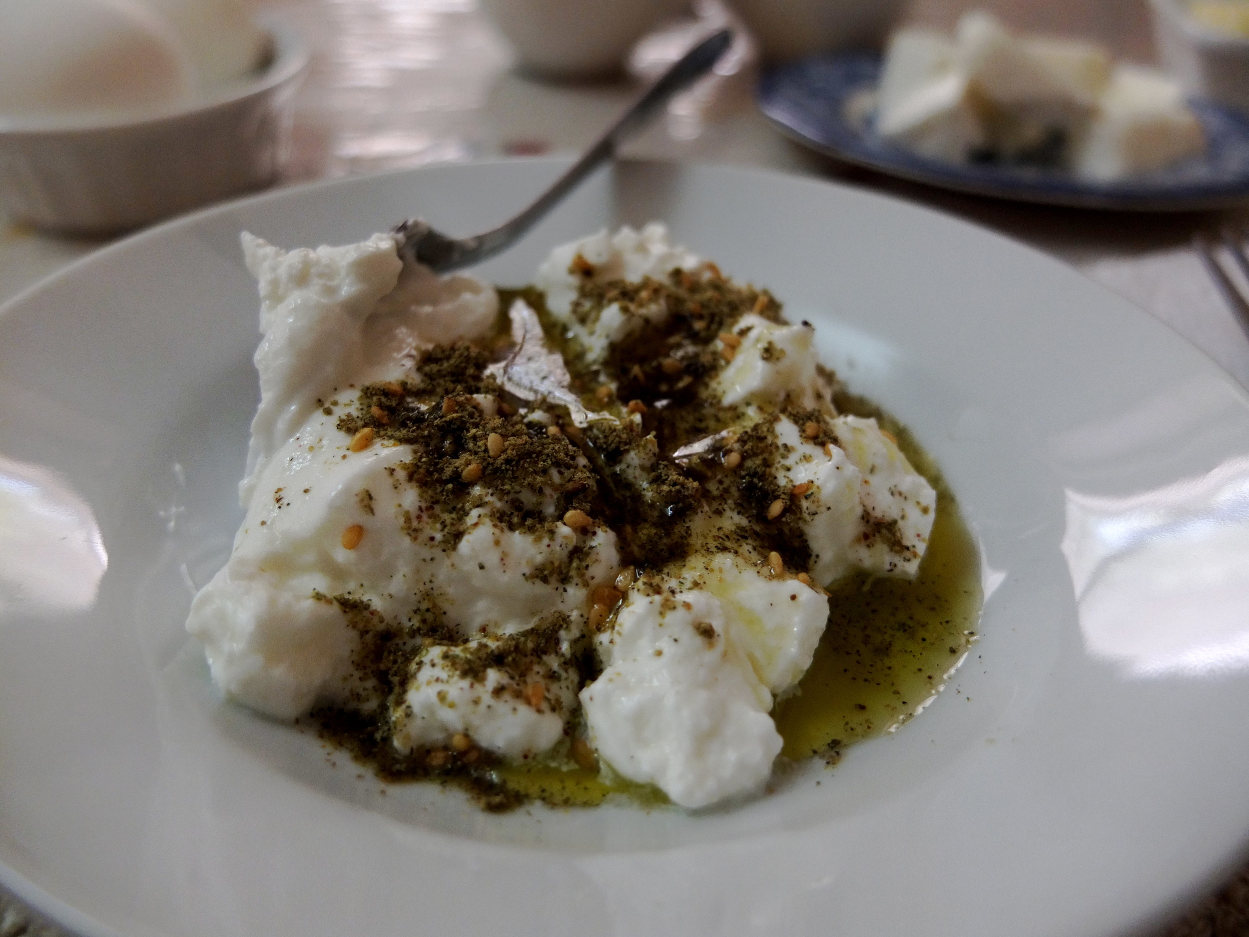    While I was in the Bethlehem area, I stayed with an elderly couple—Maryam and Karim—in nearby Beit Sahour. My first morning, I awoke to a gorgeous breakfast     spread laid out by Maryam: warm, fluffy bread; homemade apricot jam; a boiled egg;    