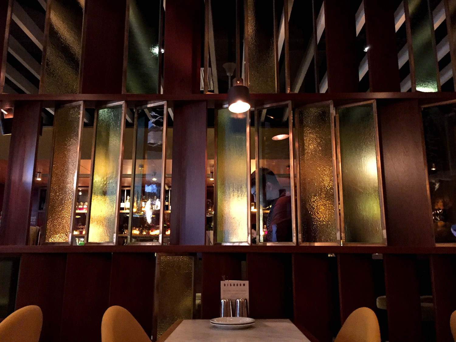 This wall of shutters separates the bar from one of the dining areas. Gorgeous.