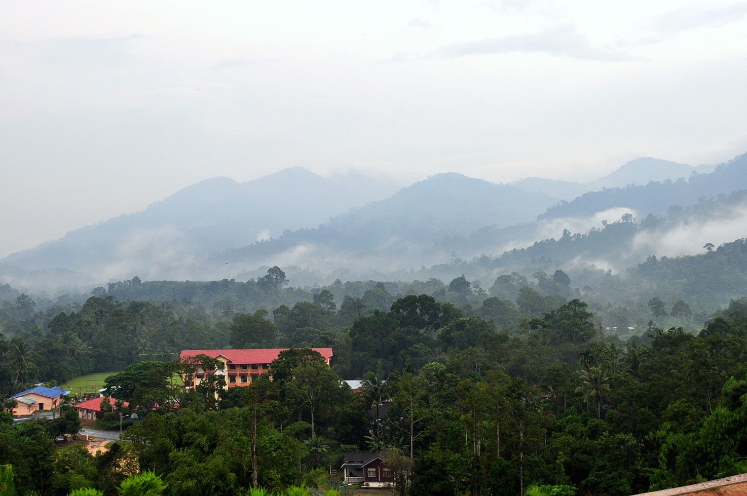 A view of the misty Banjaran Titiwangsa from Janda Baik in the early morning
