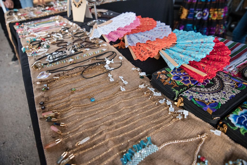 Artist Booth at Taco Fest with necklaces and other great jewelry.
