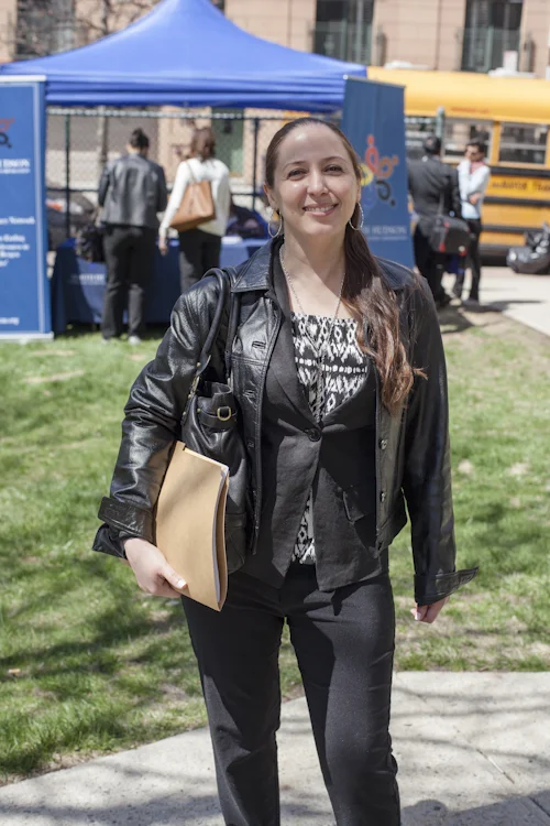 Bibi was early to the fair. She even helped some of the booths get set up. The organizer saw her dedication and offered to personally help Bibi get employed. Getting Bibi to stand still for a formal portrait can be tough. She is a ball of energy. 