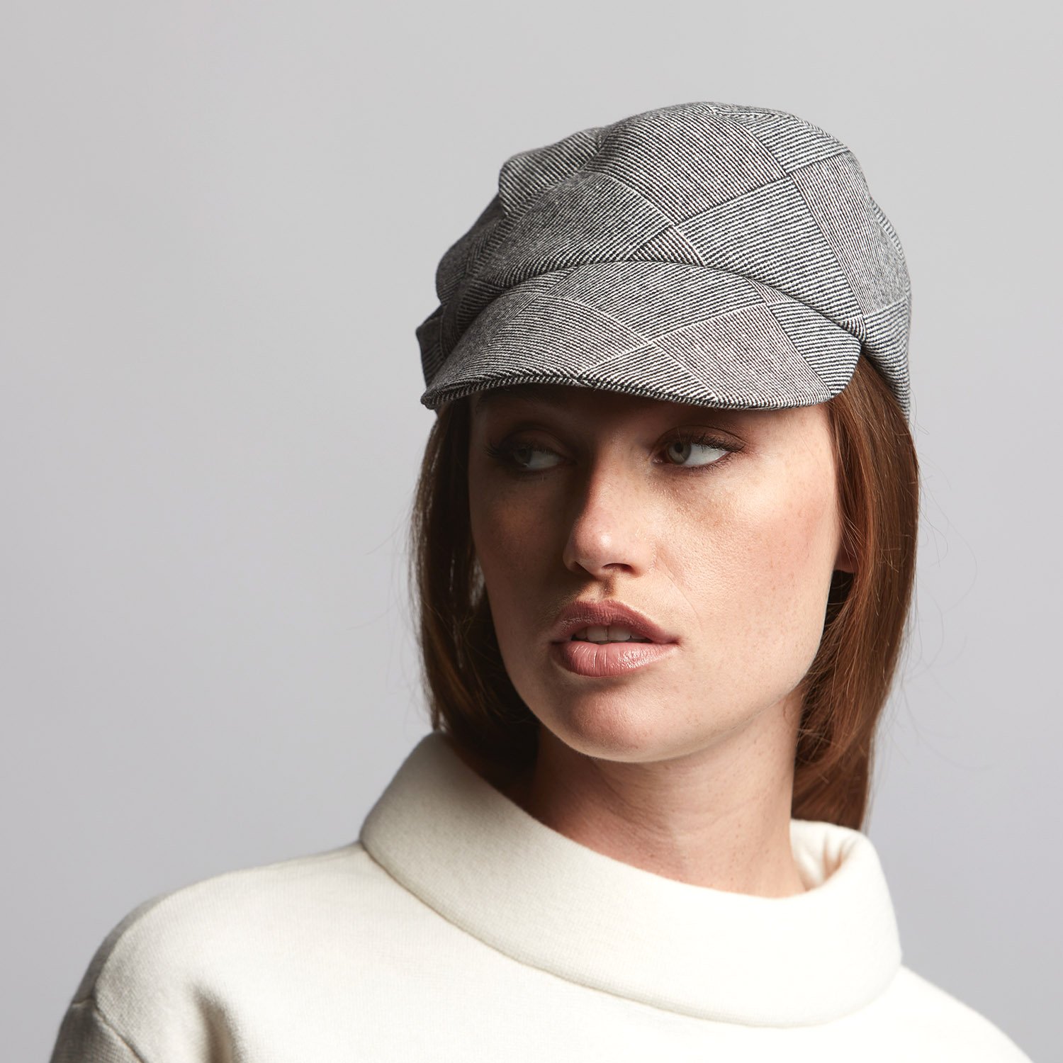 Pure Wool Peaked Cap: 'Lee' in black and white check — Karen Henriksen