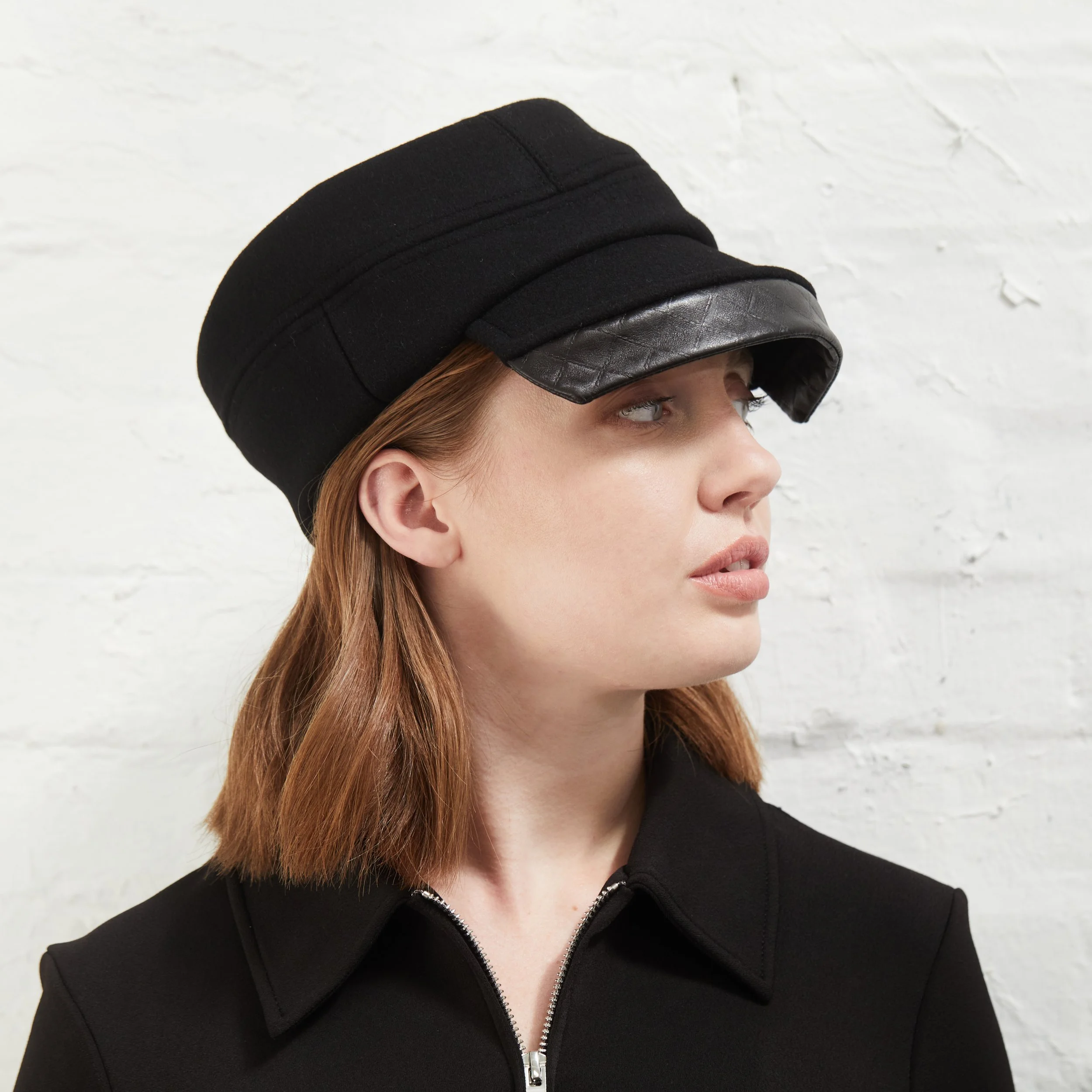 Wool Peaked Cap with Leather Detail by Karen Henriksen: 'Lauren' in black, side view