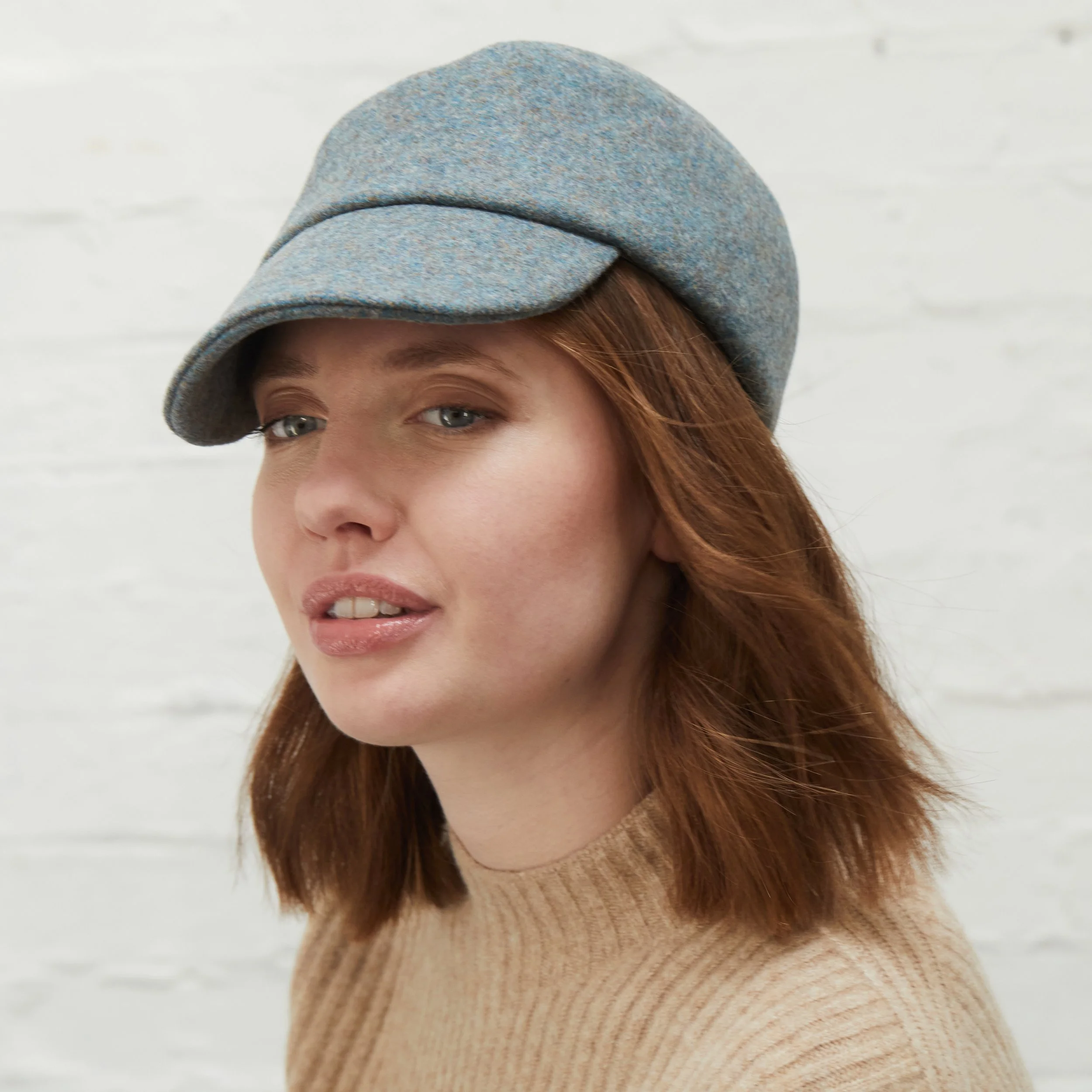 Shetland Wool Peaked Cap by Karen Henriksen: 'Lee' in soft blue, side view