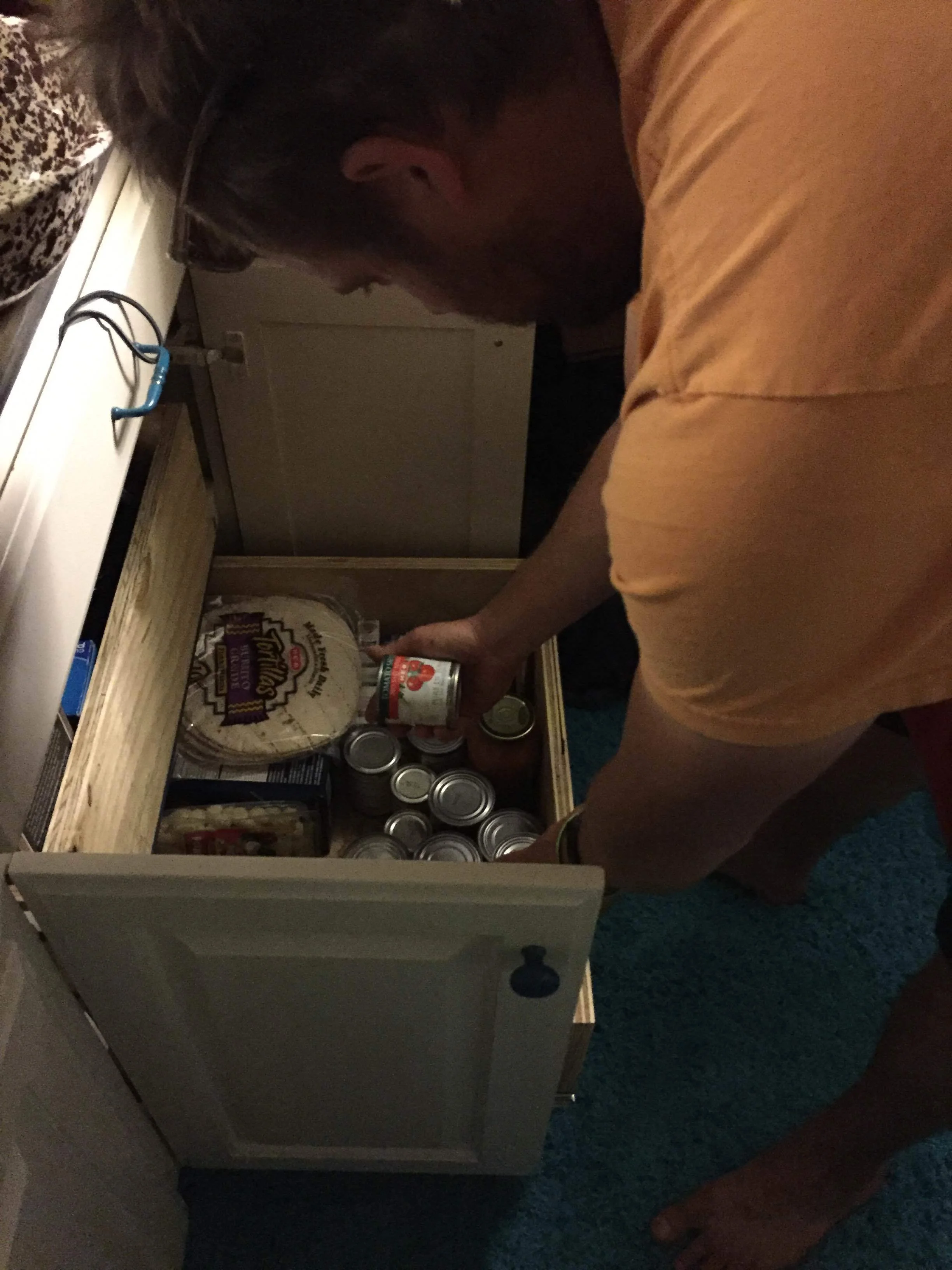 I wish I'd taken a better photo of these drawers. When I finally take the time to build a dedicated photo page for our conversion, I'll include one for sure. There are two large deep and heavy duty drawers to hold our cooking ware, dishes and pantry items in the far side of the kitchen.