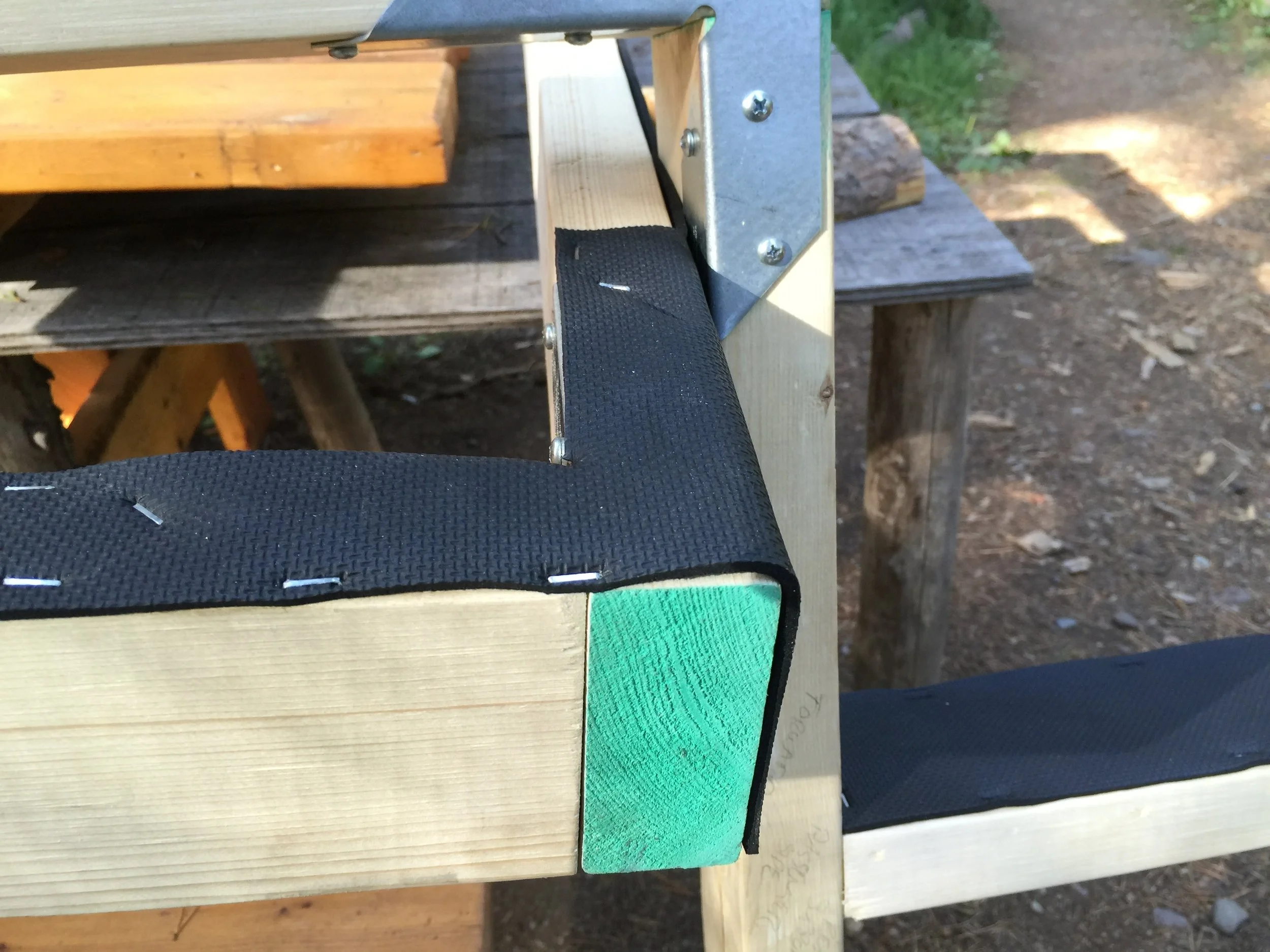 The bottoms of the frames were wrapped in neoprene to prevent chaffing on the fiberglass and gelcoat.
