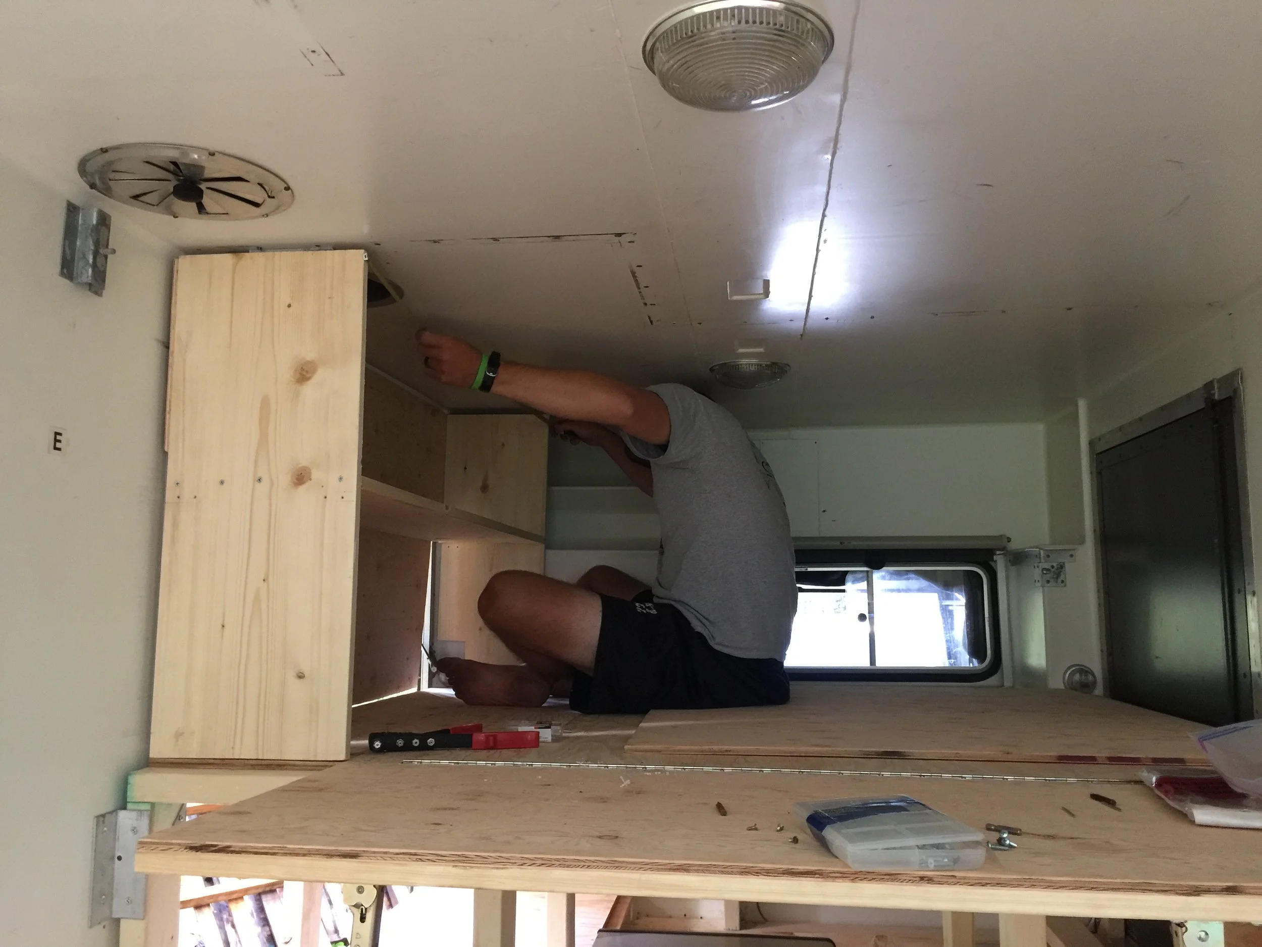 The same bedroom clothing storage, nearly installed.