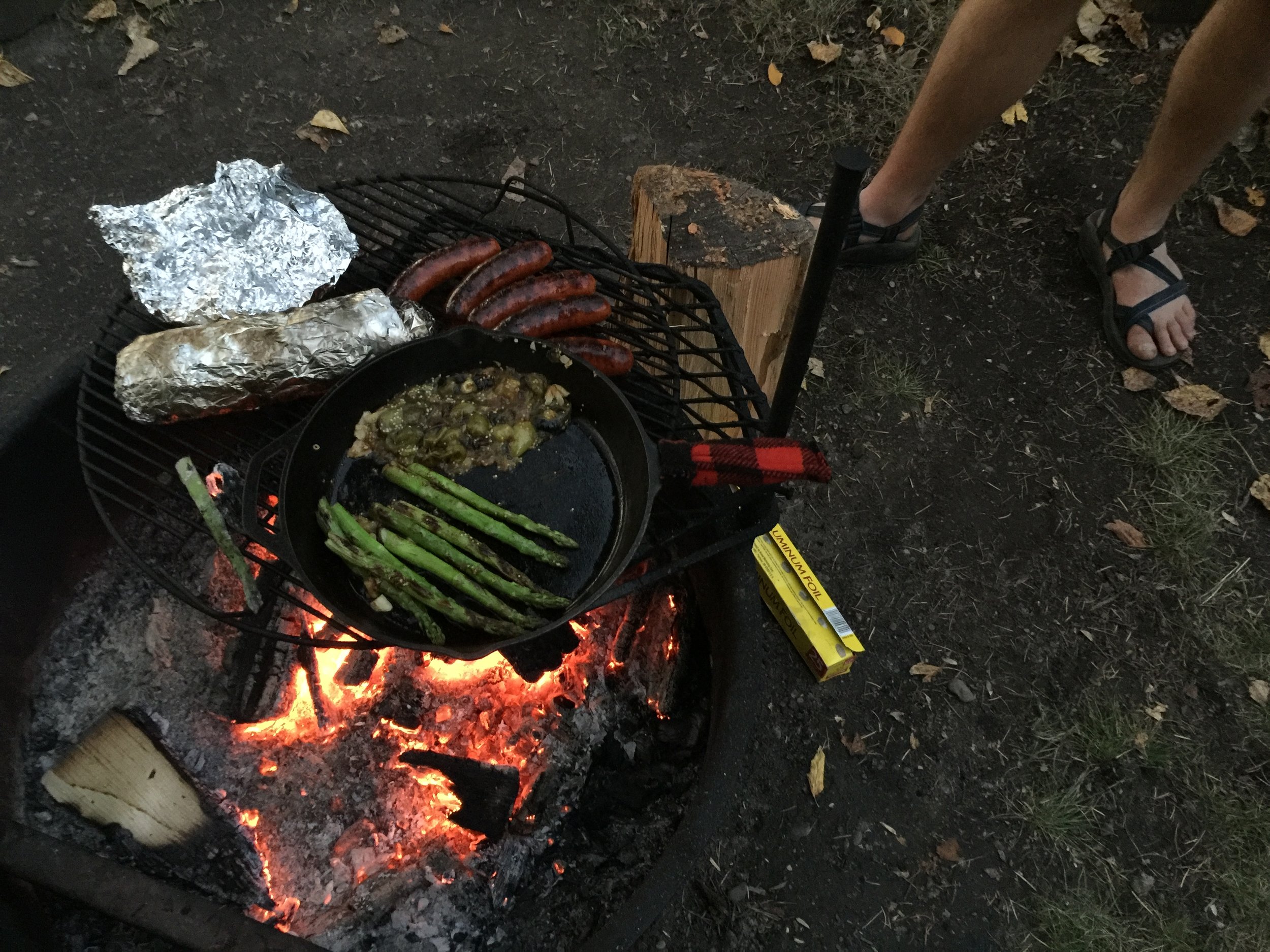 Dre and Caleb organized a superb campfire potluck, with dishes coming out all night, all cooked over coals. Brats, lamb, asparagus, root vegetables, shallots, and more.