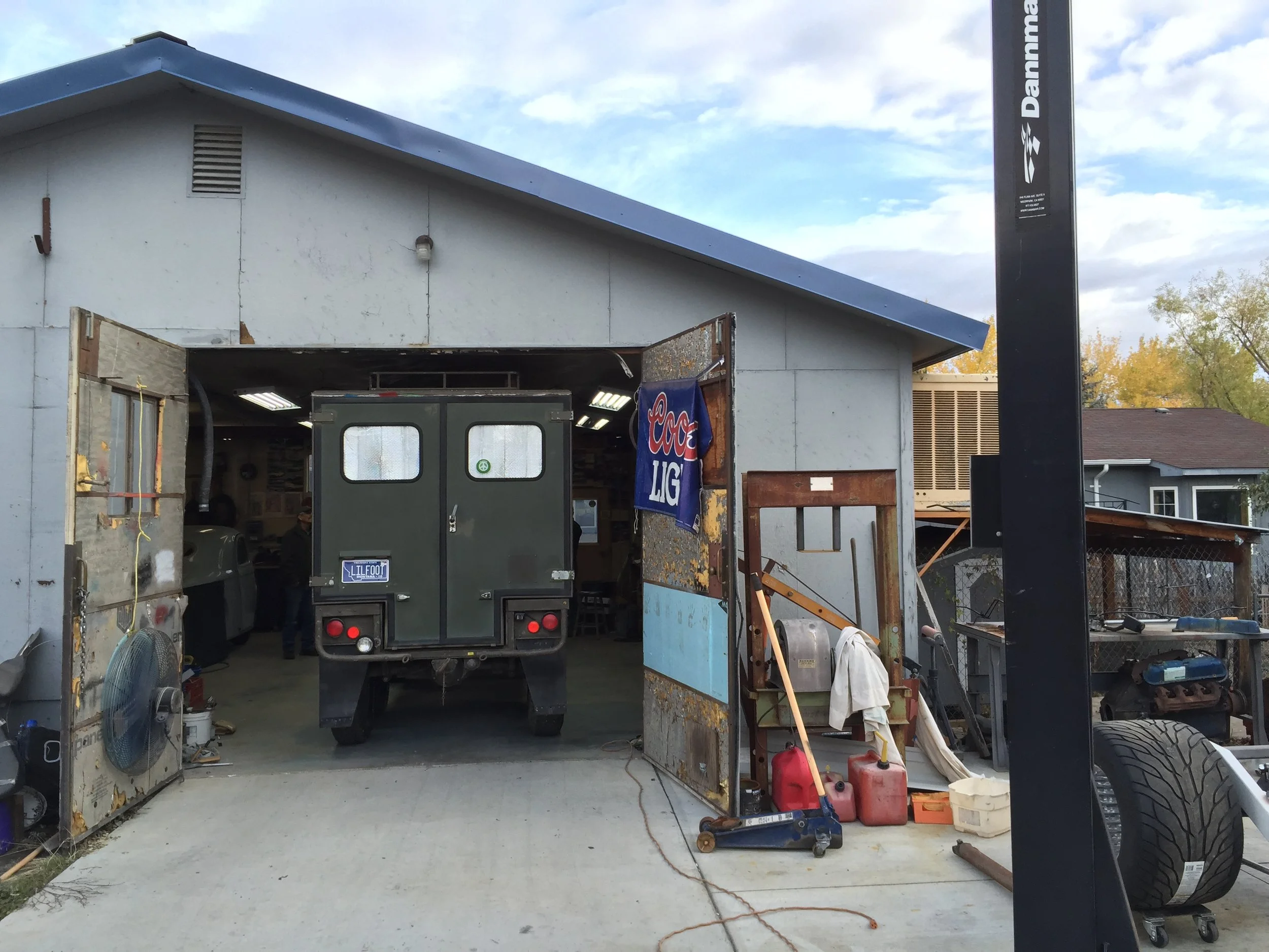 Think short thoughts! We barely fit. You can see the exhaust fan on the left side of the garage door.