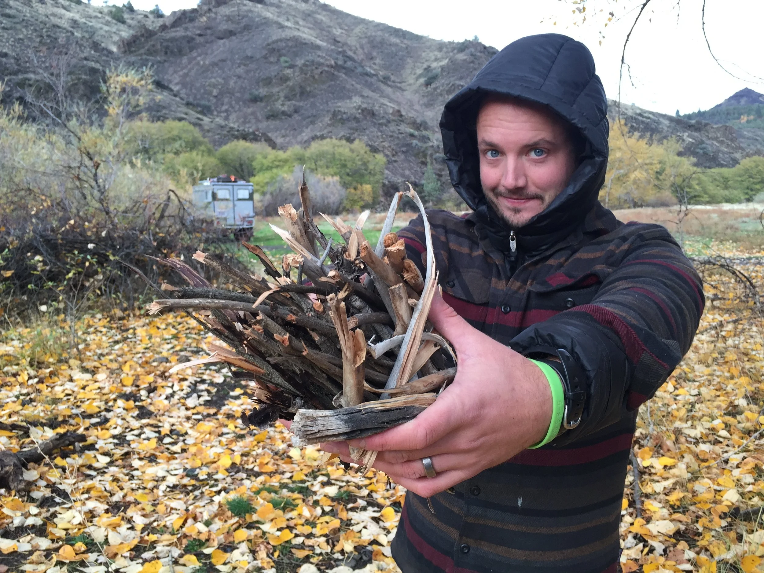 Collecting firewood at camp, the Cubic Mini Woodstove burns mini wood!