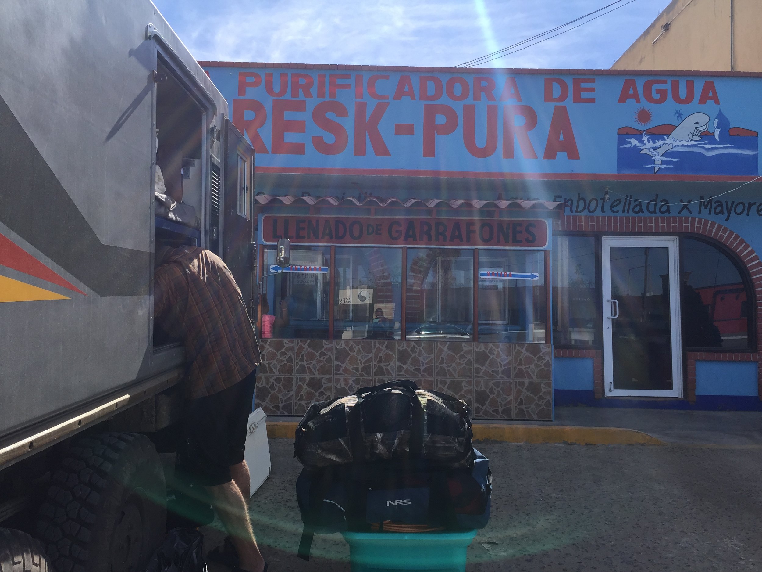Digging out our water tanks to refill. Agua Purificada shops are plentiful and cheap. Even better…the water they produce is absolutely delicious.