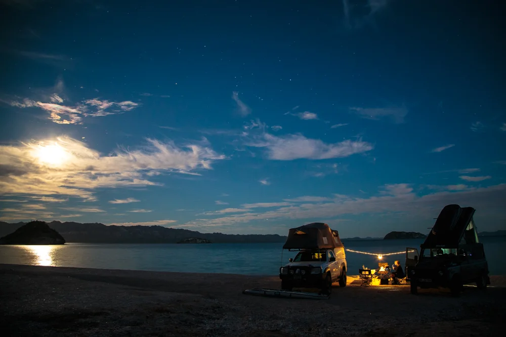 The rigs of The Trail Gypsies and Jan/Diana posing in the moon light.