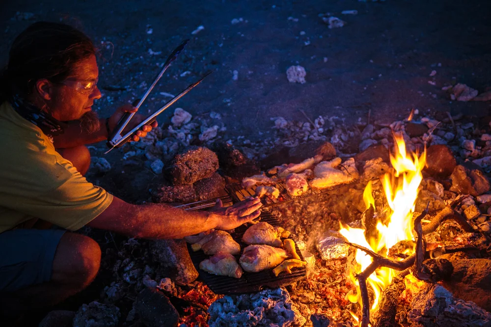 Temperature is taken by placing your hand near the fire - great respect.