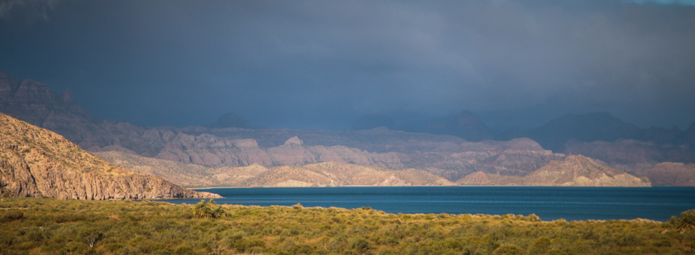 Weather moving in and out over the mountains.
