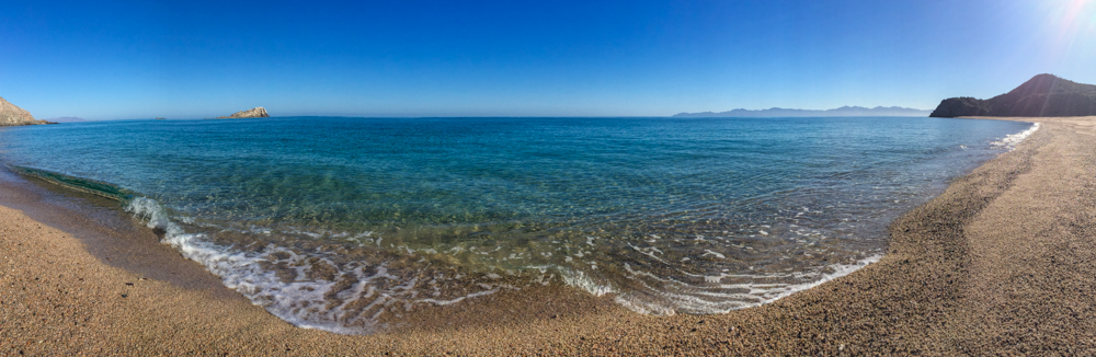 The beach, with some of the cleanest and clearest water we've seen yet.