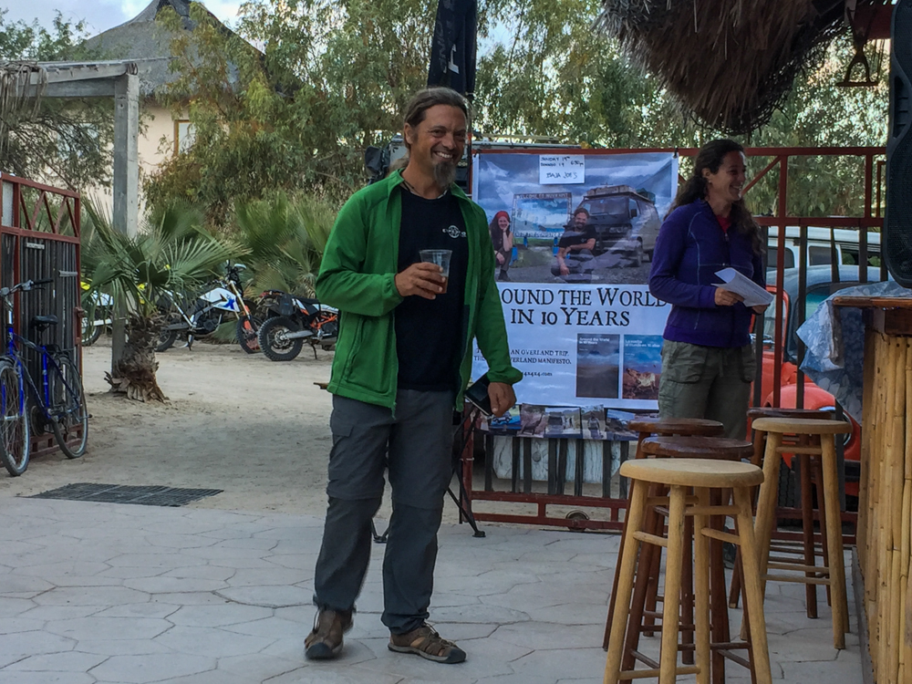 Pablo and Anna preparing for their talk, and mostly waiting for the sun to go down so the projector could be useful.