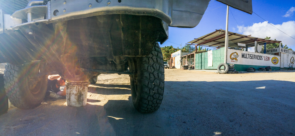Changing the oil at a closed tire shop.