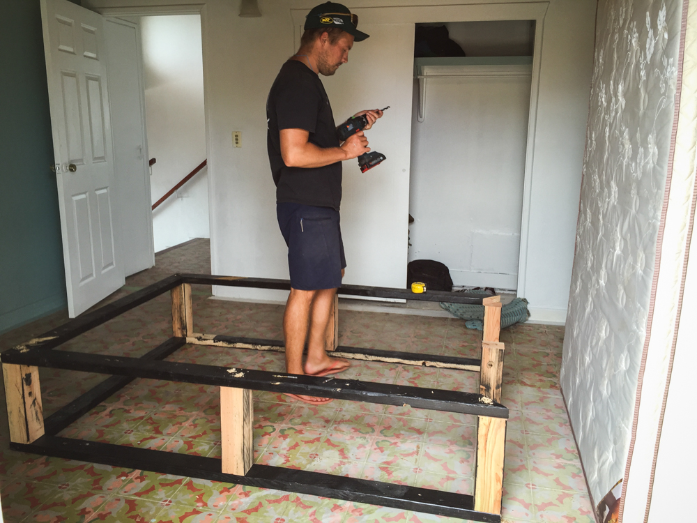 Christian building a bed frame for the mattress for the recovery room. He actually built it specifically for a height that would be more comfortable for me to get in and out of. What a guy!