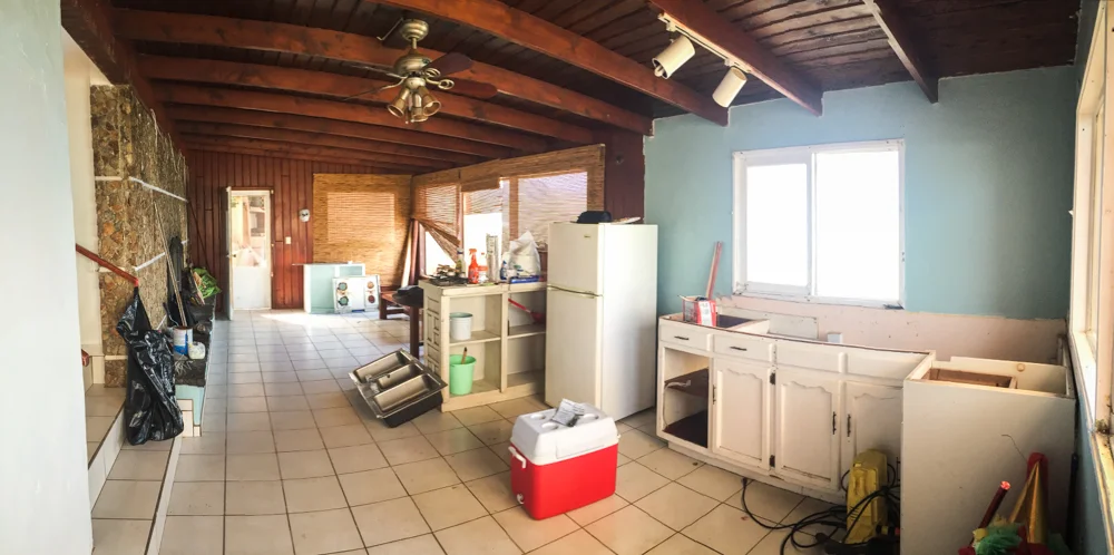 The old kitchen, coming apart. SOme other travelers had already painted the walls.