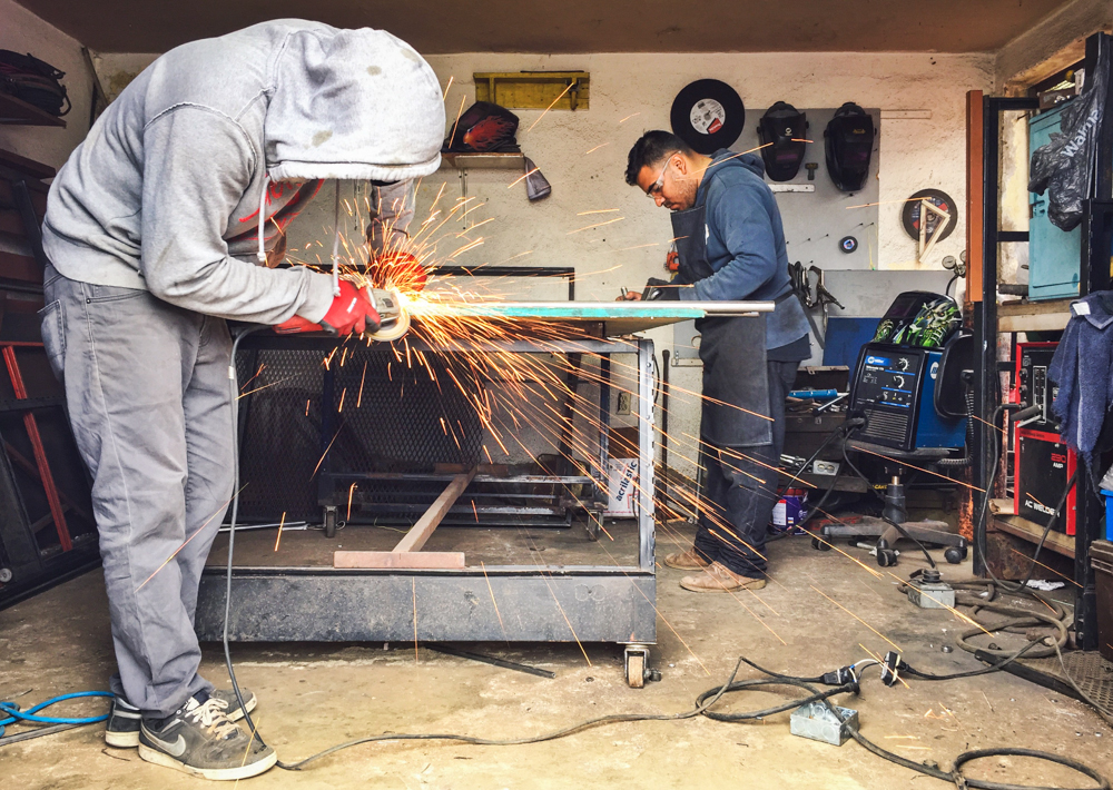 Lupe and Mario getting after it in the workshop.