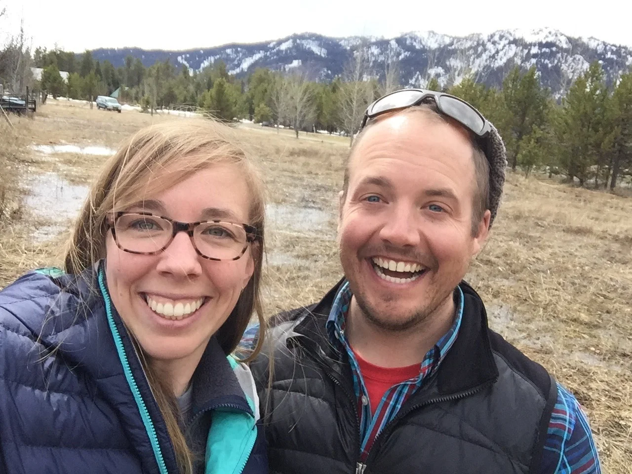 This was us on the lot on purchase day - you can see Tamarack Resort’s ski runs behind us above my head.