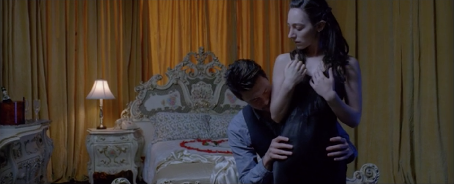 A young woman in a honeymoon suite, abandoned by her fiance, dreams of a mysterious man. Directed by Meredith Koch Cinematography by Tara Violet Niami