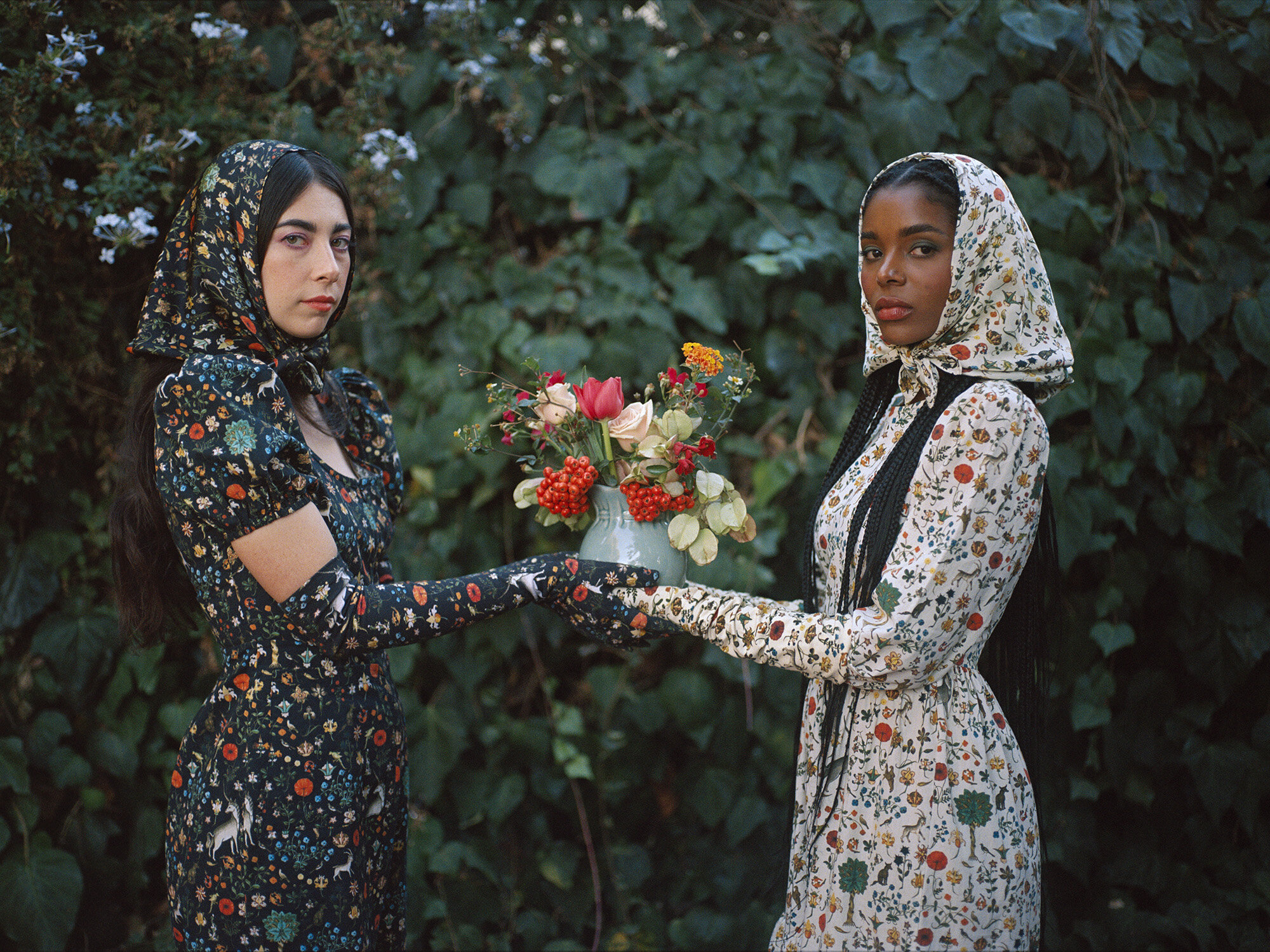 Eve and Kandia with flowers.jpg