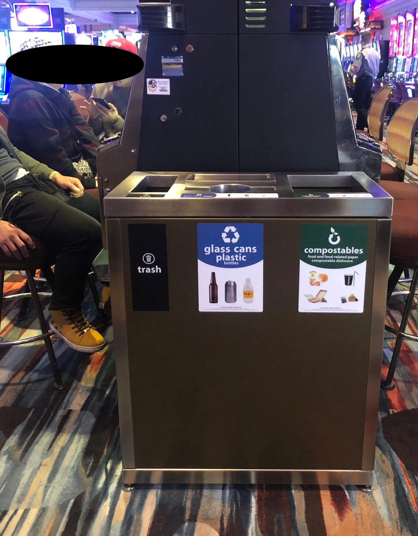 New waste collection bins at Little Six Casino, featuring Recycle Across America standardized signs.