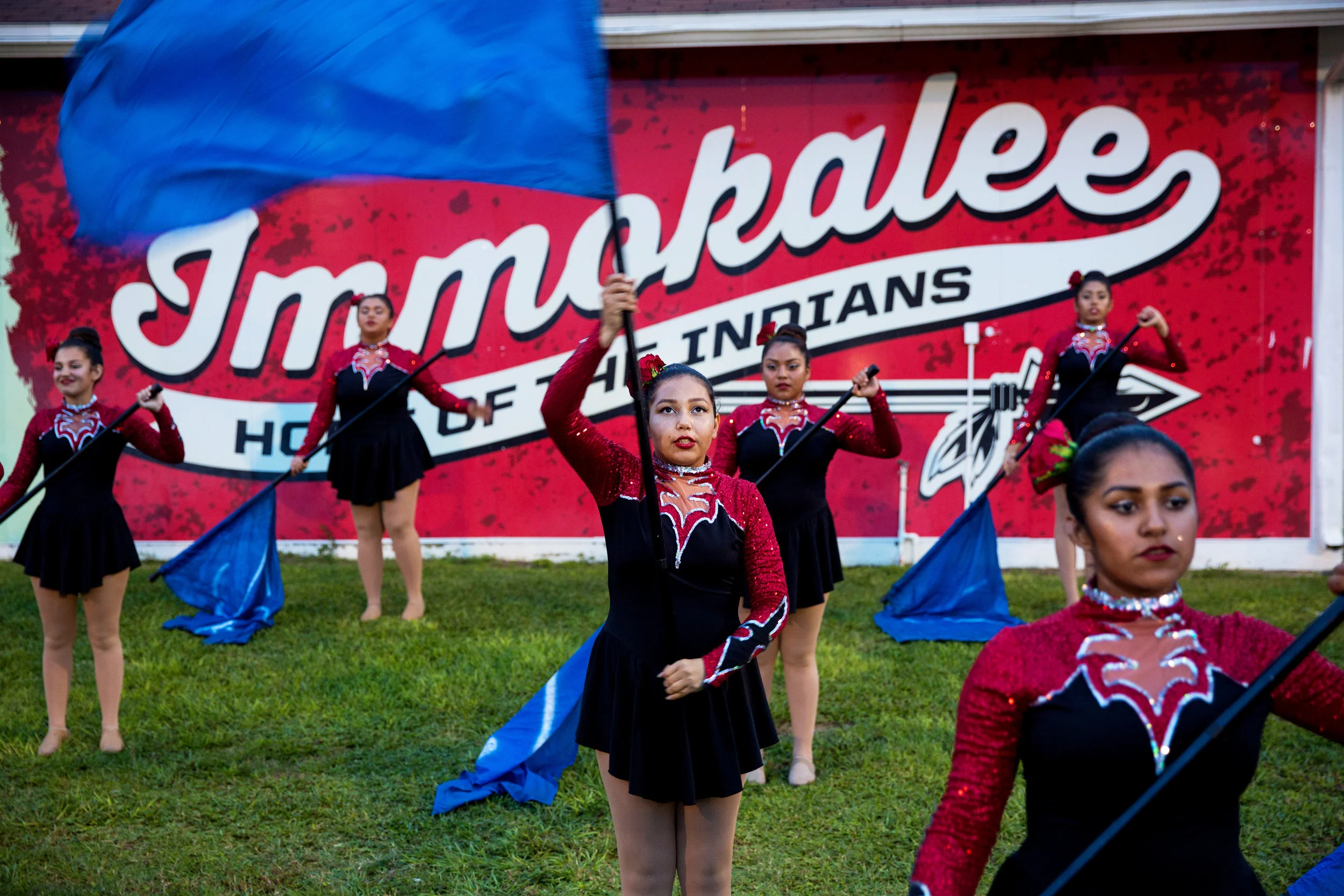  The Immokalee Indians color guard practices before the halftime show of the Harvest Bowl matchup at Gary Bates Stadium in Immokalee, Florida on Friday Sept. 2, 2016. The Tigers defeated the Indians 20-17.&nbsp; 