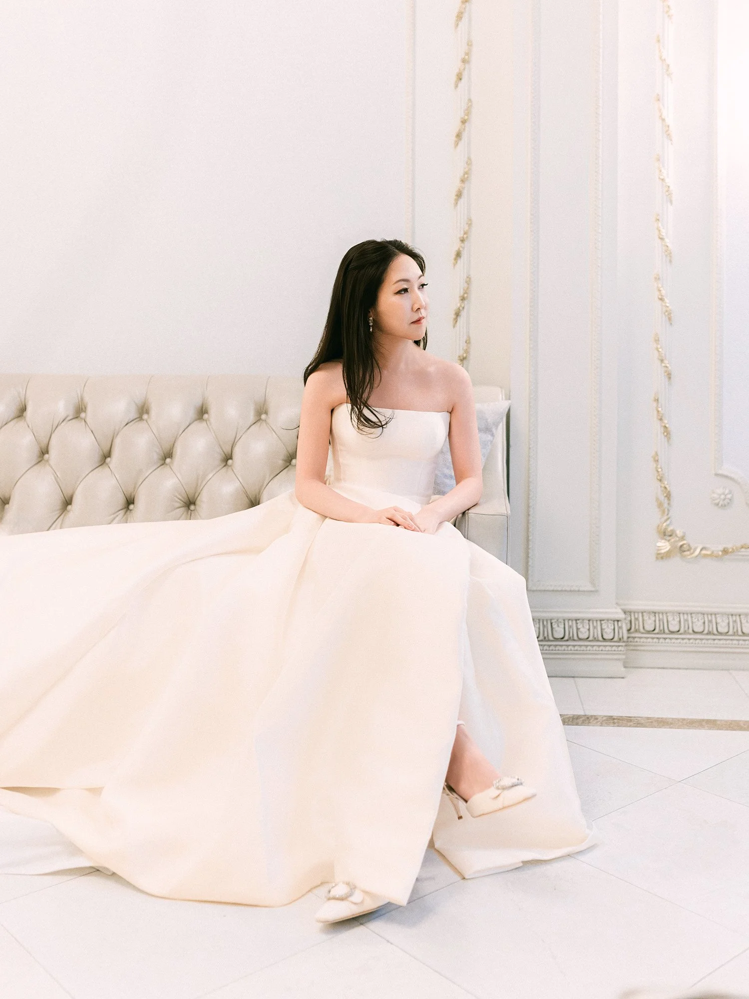  A grand and vibrant wedding portrait of Jenny and Shay sharing a joyful moment inside the luxurious ballroom of The Venetian in New Jersey. 