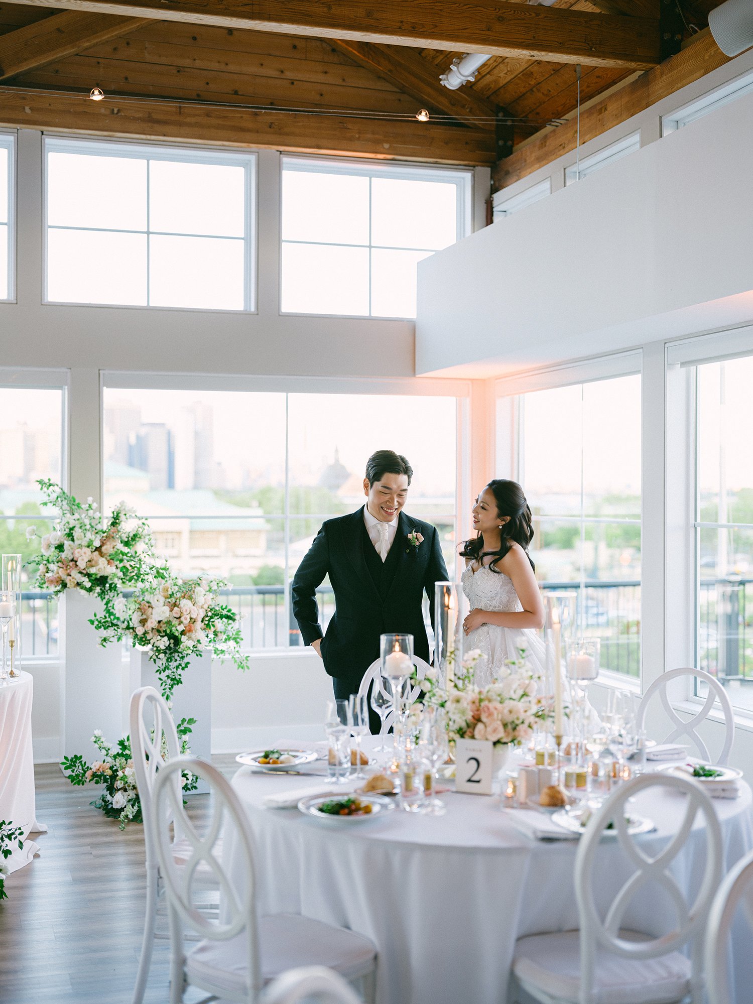 Wedding portrait of Jennifer and Andy at Maritime Parc NJ with the sunny Manhattan skyline in the background by Haseok Chung Studio.