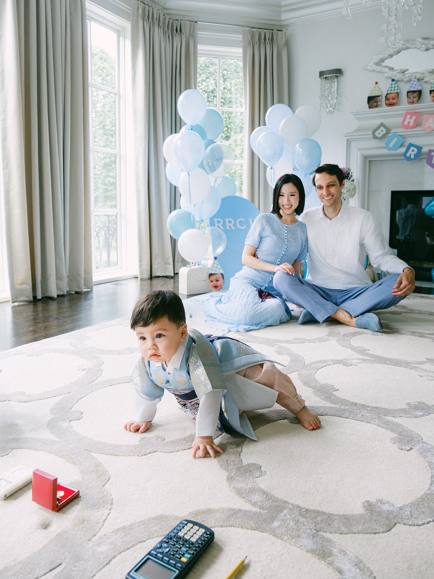 Natural family portrait during a first birthday celebration