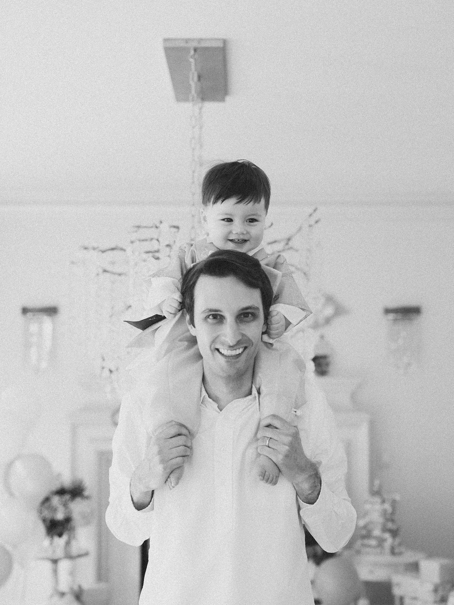 Natural family portrait during a first birthday celebration