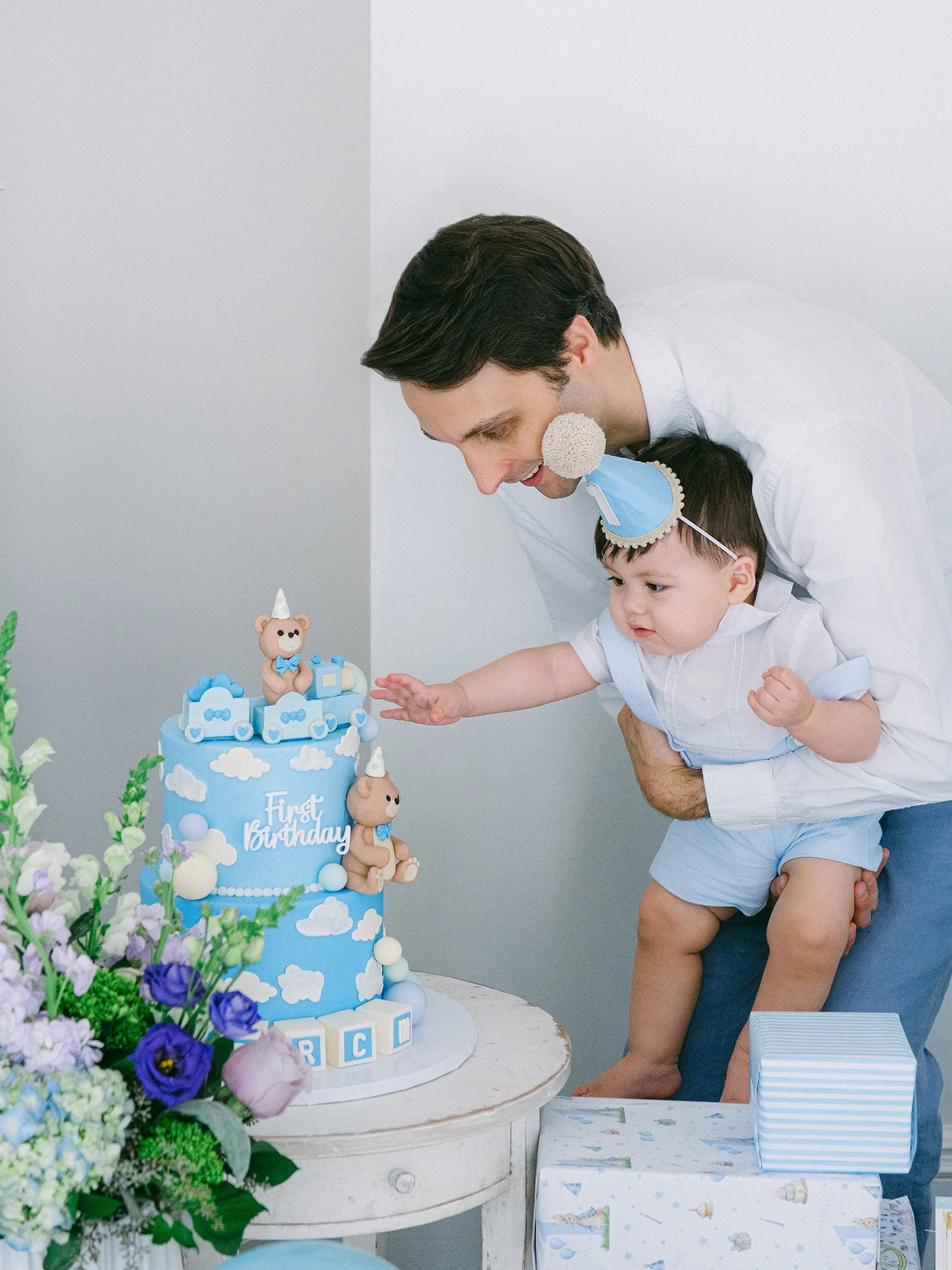 Candid moment between parents and their one-year-old son