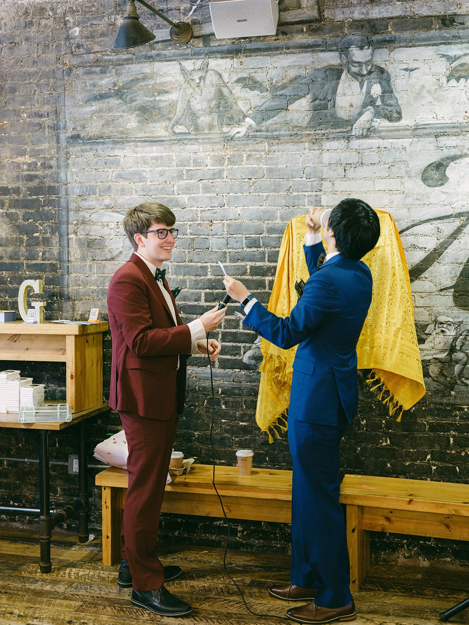 Allen and George exchanging vows during their intimate New York wedding