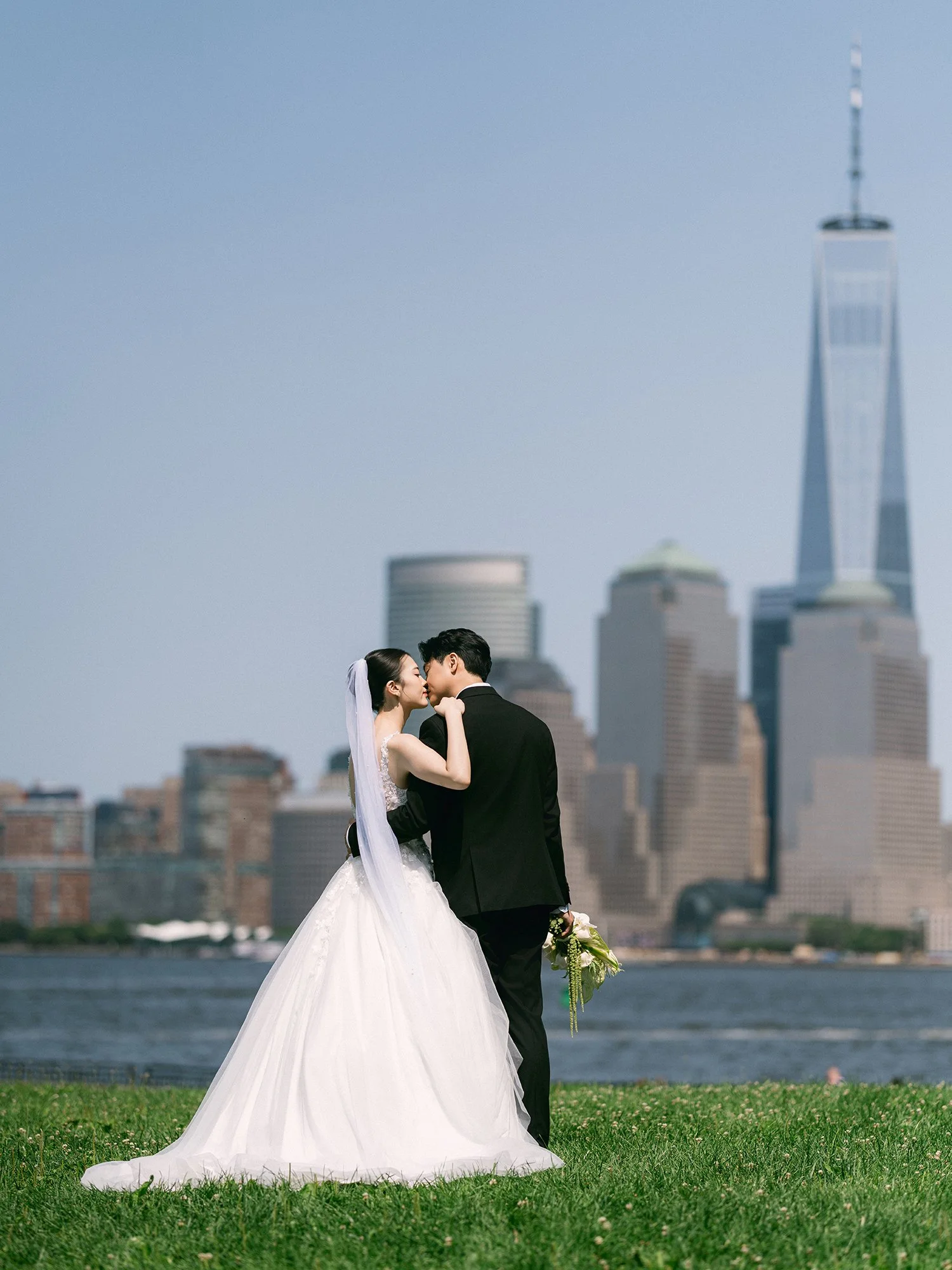 Bride and groom wedding portrait by the waterfront at Maritime Parc Jersey City