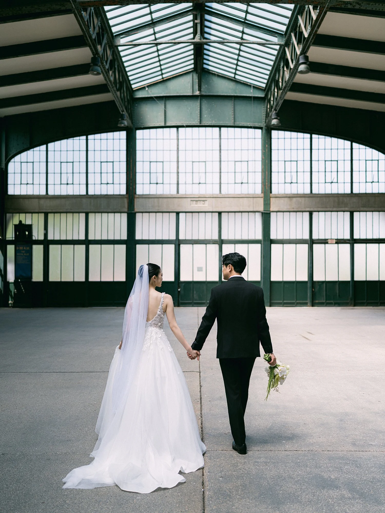 Bride and groom wedding portrait by the waterfront at Maritime Parc Jersey City