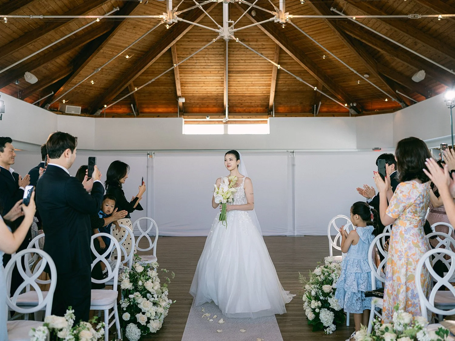 Hannah and Junsuk during their summer wedding ceremony in New Jersey