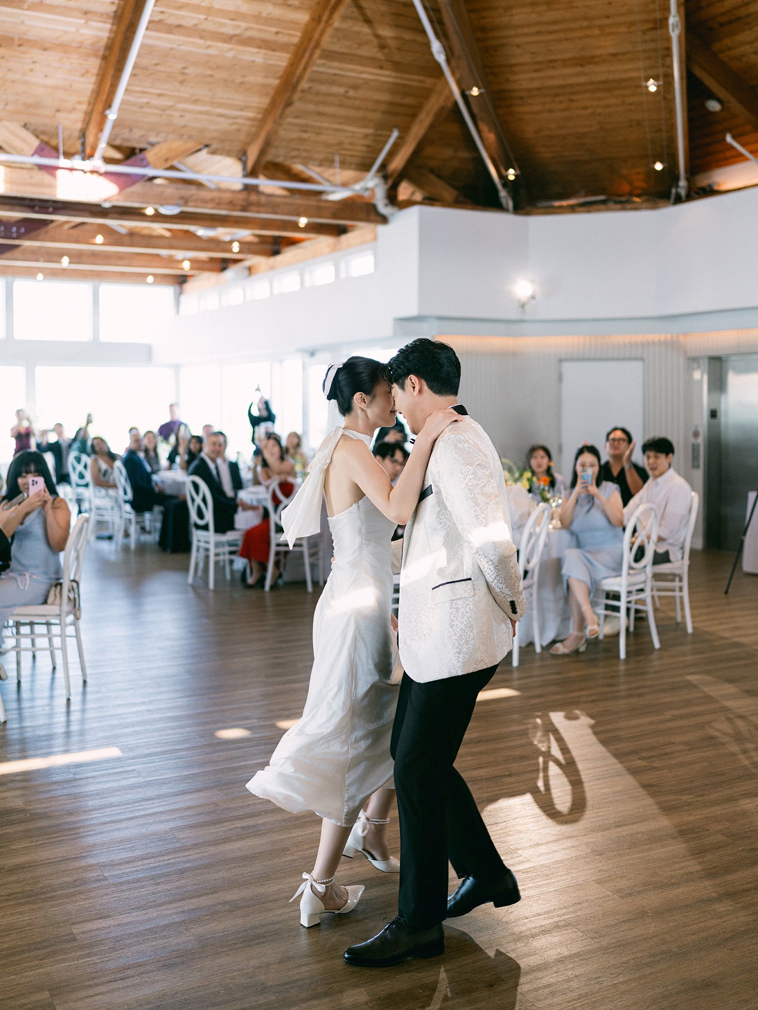 Hannah and Junsuk celebrating their wedding reception at Maritime Parc
