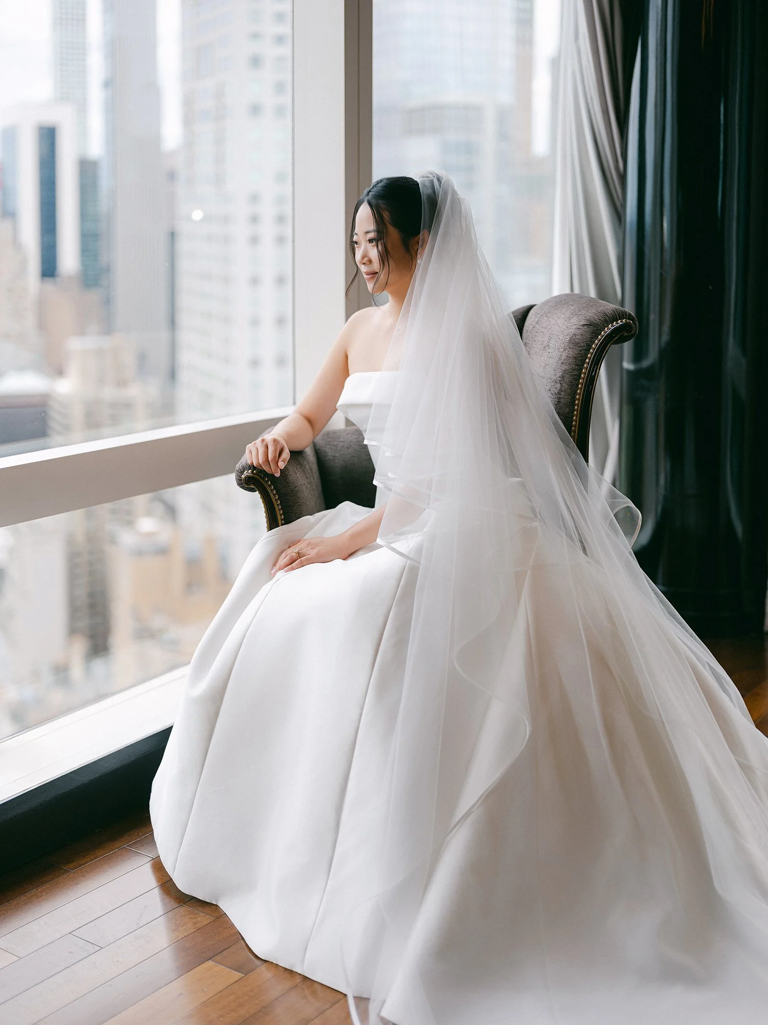 Bride Kathy getting ready in the bridal suite at the Mandarin Oriental, Columbus Circle wedding morning