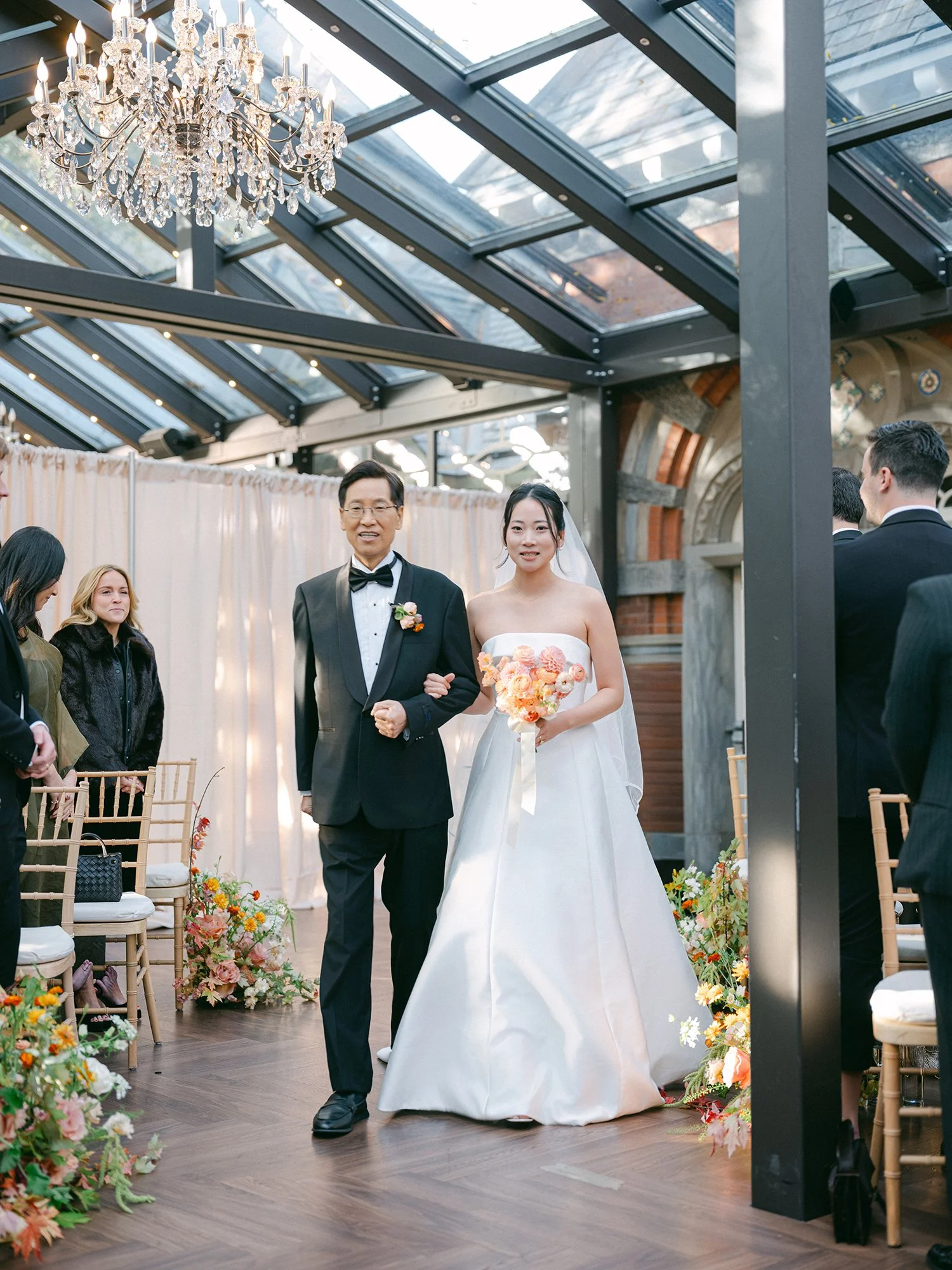 Kathy walking down the aisle at the Tavern on the Green courtyard ceremony