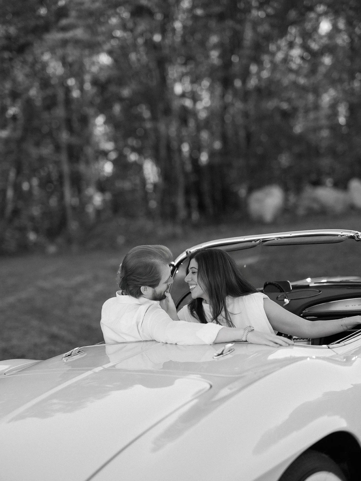 Candid moment between Daniel and Sandra overlooking the Hudson Valley at sunset